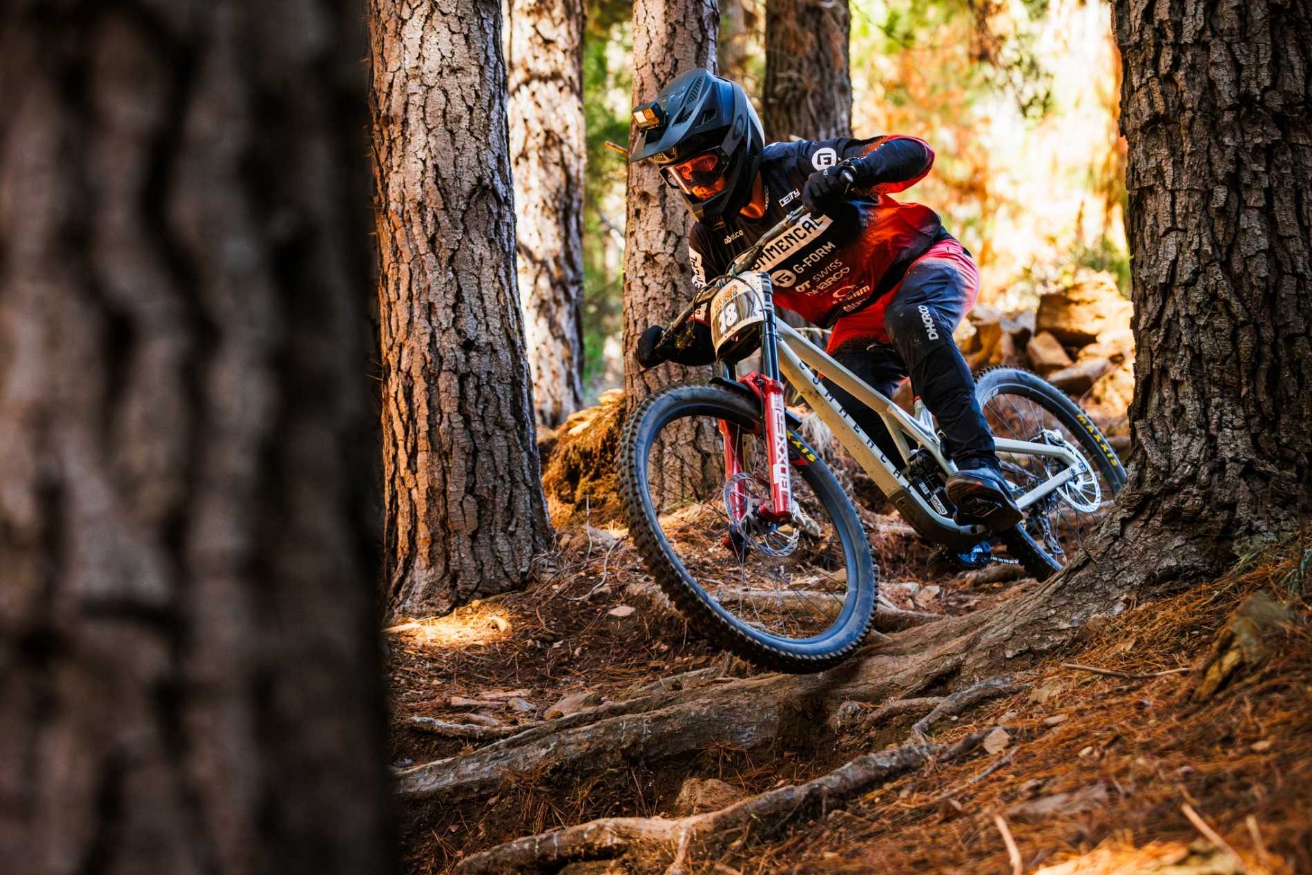Pro rider at Mystic Bike Park on Double black technical trail at Mystic bike Park